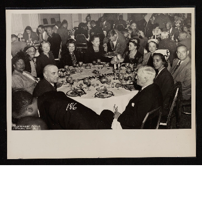 Dinner banquet (left-right): Mrs. Ashley L. Totten, Mrs. A. Philip Randolph, Mrs. Vincent Impellitteri, Mrs. Bessie Buchanan, Mrs. Williams, unidentified, unidentified, Jack Blumstein, Mrs. Edith Alexander