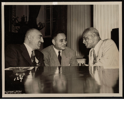 C.L. Dellums, Ralph Bunche, and Ashley L. Totten talking