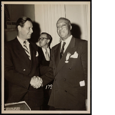 Maurice Tobin shaking hands with A. Philip Randolph