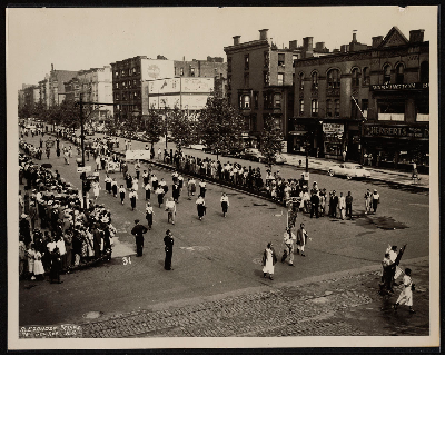 Union members marching in parade at West 125th Street New York City, New York