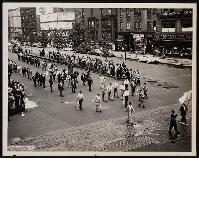 Union members marching in parade at West 125th Street New York City, New York