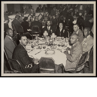 Dinner banquet (left-right): A.R. Blanchette, Mr. and Mrs. Manson of Chicago, Ed Lewis of NYC Urban League, Ernest Smith of Chicago, C.S. Wells of Cleveland