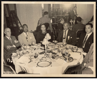 Dinner banquet (left-right): Bernard Gilroy, B.F. McLaurin, Mrs. McLaurin, William H. Howe, J. Kanter