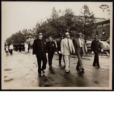 W.C. Mills, A. Philip Randolph, Thomas T. Patterson, D. LaRoche, W.H. Sanders, and H.A. Rock marching in parade