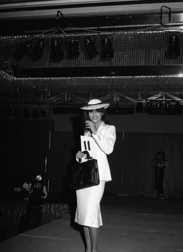 Black Gold Trade Show Pageant participant modeling, Los Angeles, 1983