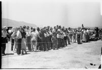 Crowd gathers to catch a glimpse of the airplane that set a world record, flying non-stop from Moscow to southern California. July 14, 1937