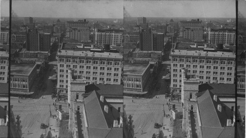 A little west of south from tower of Medical Arts Bldg. to Houston St. and City of San Antonio. Texas. View of City and Houston St. from Roof of Medical Arts Bldg., San Antonio, Texas