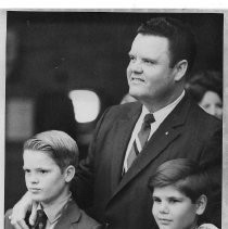 Newly elected Sheriff Duane Lowe with his son Rex (left) and another boy