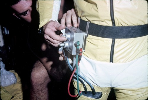 Diving equipment strapped around a diver's waist