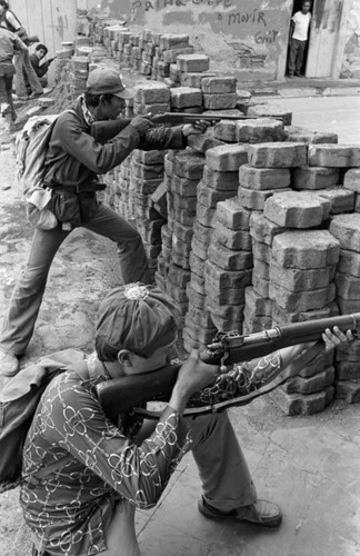 Sandinistas behind a barricade, Nicaragua, 1979