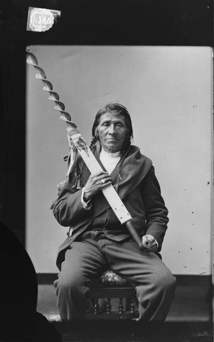 Portrait of Oshoga, member of Chippewa/Ojibwe Delegation to Washington D.C., ca. 1880
