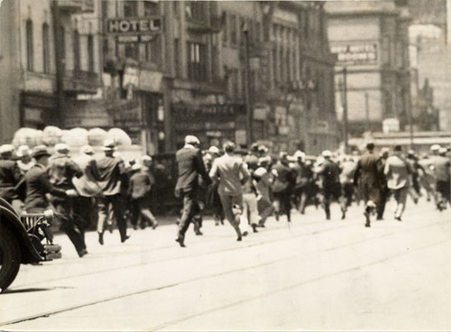 [Street scene during longshoremen's strike]