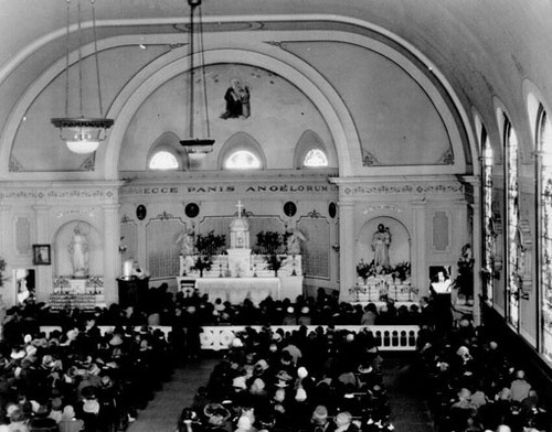 [Interior of St. Anne's Church during service]