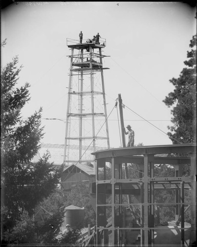 Construction of the 60-foot tower telescope and part of the 60-inch telescope under construction, Mount Wilson Observatory