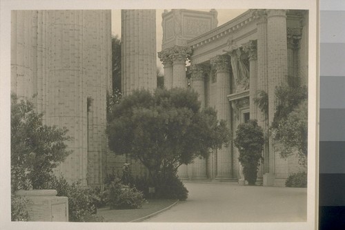 H250. [Colonnade and entrance, Palace of Fine Arts (Bernard R. Maybeck, architect; "Aspiration," figure above doorway, by Leo Lentelli).]