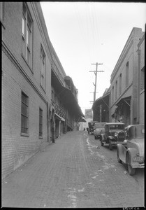 Automobiles parked in Ferguson Alley in Los Angeles's Chinatown, November 1933
