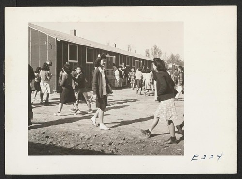 Changing classes at the temporary high school quarters. Photographer: Parker, Tom McGehee, Arkansas