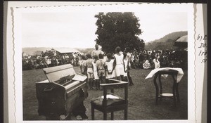 A group of pupils from a village school perform a song