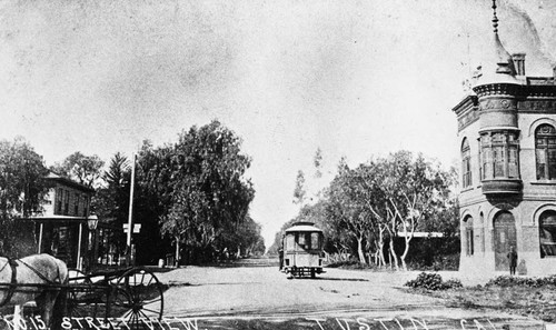 Main Street, Tustin with horse trolley and horse and wagon