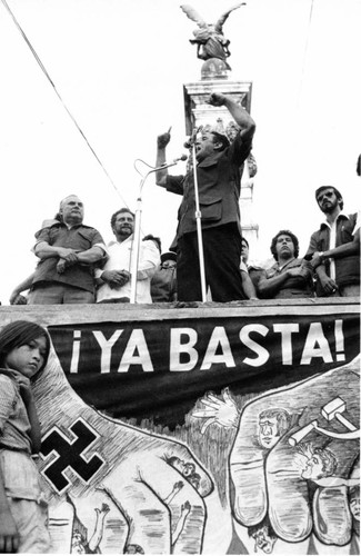 José Napoleón Duarte speaks above a poster, San Salvador, 1982
