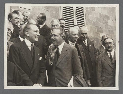 [Detail of those assembled for group portrait at Rome Conference on Nuclear Physics, with Niels Bohr, front right.]