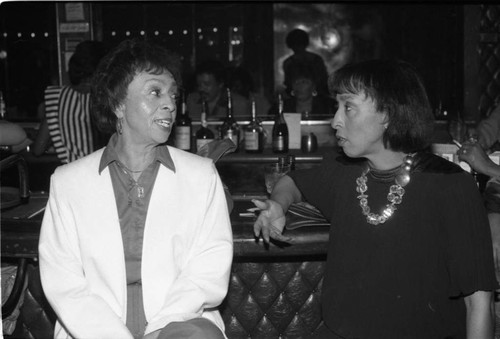 Gertrude Gipson talking with Reve Gipson at the Pied Piper nightclub, Los Angeles, 1985
