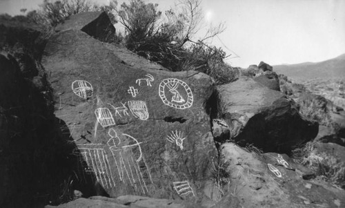 Petroglyphs, writing on stone, found in Death Valley canyon