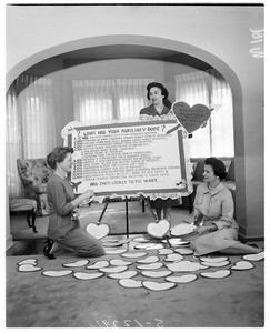 Good samaritan auxiliary woman planning valentine party, 1958