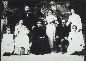 Standing: the Vice-Consul in Berdjansk, Alexander Sukkau (the brother-in-law of my brother). Seated you see Mrs Anna Maria, née Müller, with the baby, Alexander. In the foreground