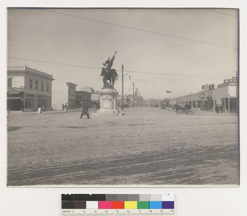 Van Ness Ave., San Francisco. Looking north from Market Street after the fire of April 18, 1906. (Note--Statue later moved to Van Ness Ave. [i.e. Market?] & Dolores Street.) (Tracks & slots of cable cars on Market St.)