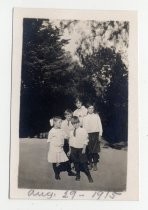 Group portrait in gardens, possibly Winchester estate