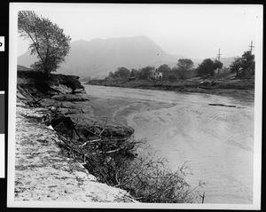 Flooded river with damaged banks, 1938