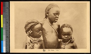 Three young children standing together, Congo, ca.1920-1940