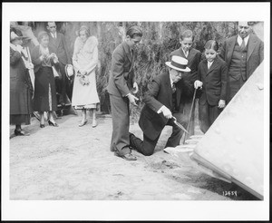 Edward L. Doheny, Sr., with trowel in hand at the Groundbreaking for Doheny Memorial Library, 1931