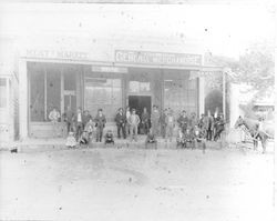 Group of people in front of Ellis and Stites General Merchandise store