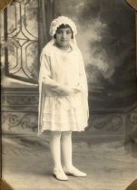 Mary Lewis in First Communion dress