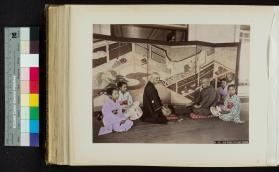 Photograph of elderly men playing shogi