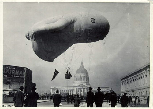 [Spectators watching a hot air balloon at the Civic Center]