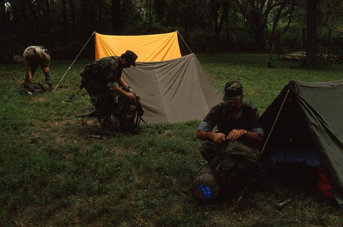 Survival school students near tents, Liberal, 1982