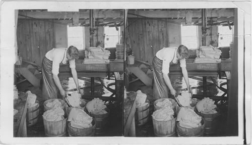 Putting the butter into tubs, New York State