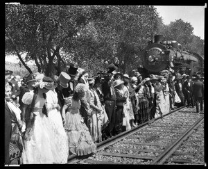 Costumed men and women along the tracks during the recreation of the Southern Pacific Line's completion, September 5, 1926