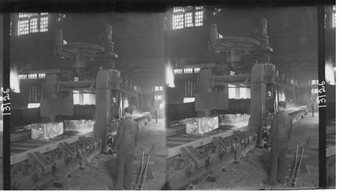 Rolls and shears in blooming mill. Hot ingot is rolled and cut into billets. Homestead, Penna