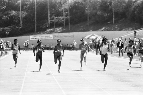 Evelyn Ashford and others approaching the finish line, Los Angeles, 1982
