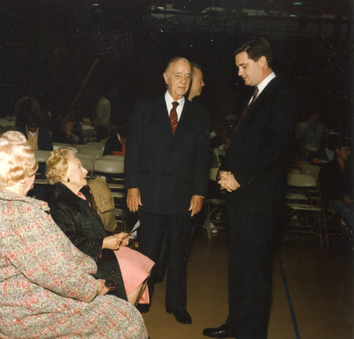 Dr. Davenport speaking to Mr. and Mrs. Odell McConnell