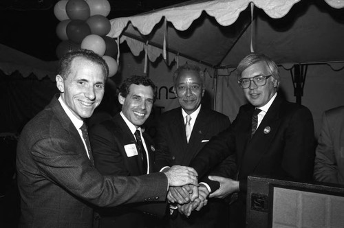 David Dinkins, Bill Press, and others posing together, Los Angeles, 1989
