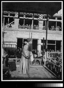 Chinese actor performing in courtyard of Women's College, Yenching University, Beijing, China, 1923