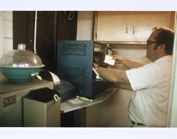 Rich Bolman working in the lab at the California Cooperative Creamery on Western Avenue, Petaluma, California, 1984