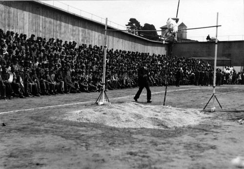 Pole vault competition, San Quentin Little Olympics Field Meet, 1930 [photograph]
