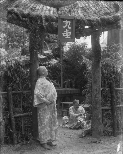 Two men in Japanese robes, Bohemian Grove. [negative]