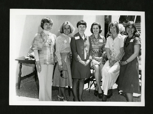 Scripps alumnae from the class of 1961 smiling together at their reunion, Scripps College